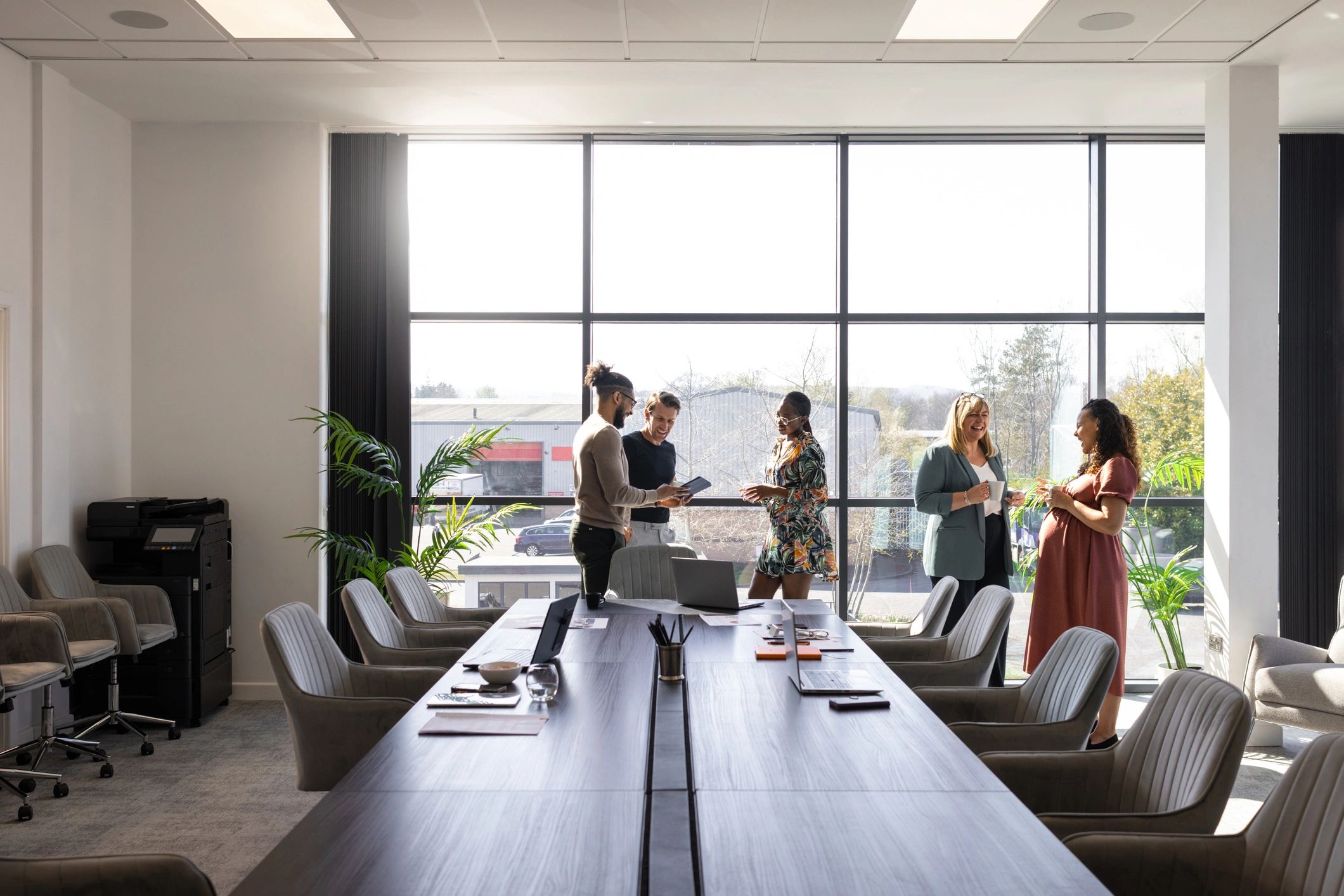 Business consulting team meeting in a modern conference room